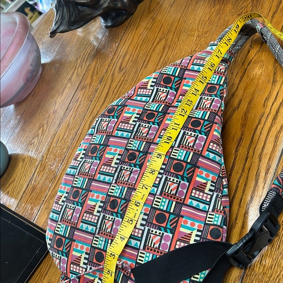 Kavu sling bag backpack in geometric print of Spring Montage.  Good condition. main image 12